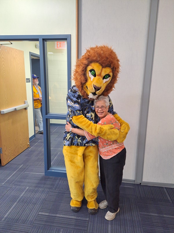the 50-50 wining with the lions club mascot