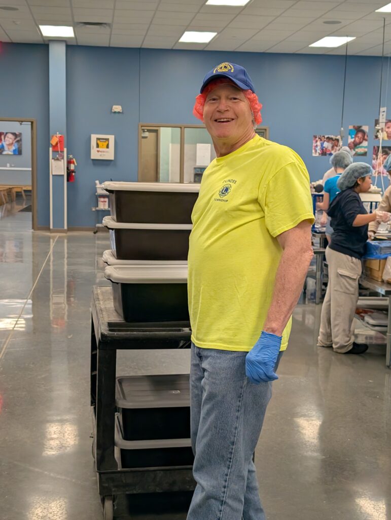 A Lion member helping